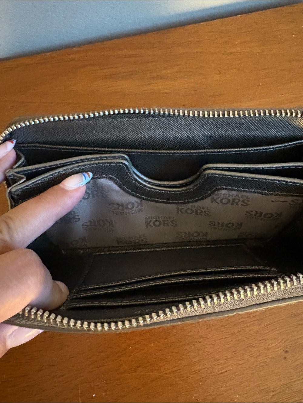 Michael Kors Shiny Silver MK Logo Zip Wallet - Picture 5 of 5